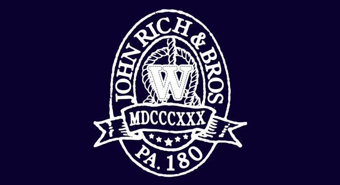 Логотип Woolrich - Stone Forest